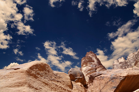 Mountains of Wadi Rum Desert also known as The Valley of the Moon is a valley cut into the sandstone and granite rock in southern Jordan 60 km to the east of Aqabaの写真素材