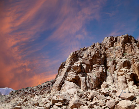 Mountains of Wadi Rum Desert also known as The Valley of the Moon is a valley cut into the sandstone and granite rock in southern Jordan 60 km to the east of Aqabaの写真素材