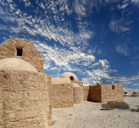Quseir (Qasr) Amra desert castle (against the sky with clouds) near Amman, Jordan. World heritage with famous fresco's. Built in 8th century, of early Islamic art and architectureの写真素材