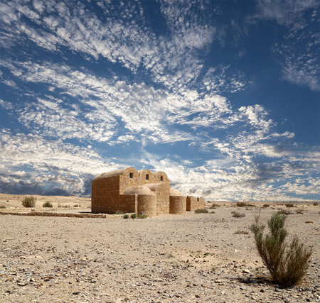 Quseir (Qasr) Amra desert castle (against the sky with clouds) near Amman, Jordan. World heritage with famous fresco's. Built in 8th century, of early Islamic art and architectureの写真素材