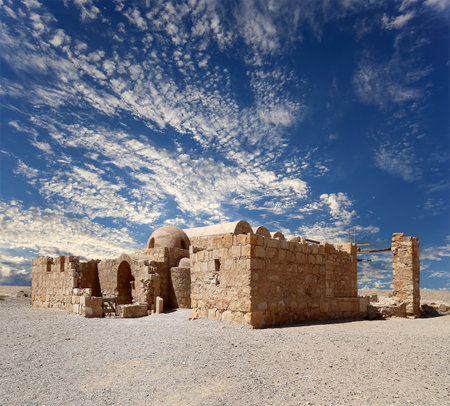 Quseir (Qasr) Amra desert castle (against the sky with clouds) near Amman, Jordan. World heritage with famous fresco's. Built in 8th century, of early Islamic art and architectureの写真素材