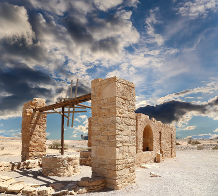 Quseir (Qasr) Amra desert castle (against the sky with clouds) near Amman, Jordan. World heritage with famous fresco's. Built in 8th century, of early Islamic art and architectureの写真素材