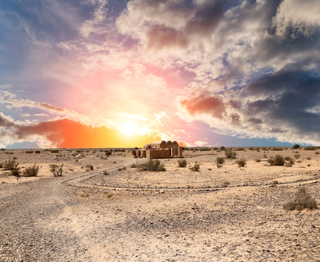 Quseir (Qasr) Amra desert castle (against the sky with clouds) near Amman, Jordan. World heritage with famous fresco's. Built in 8th century, of early Islamic art and architectureの写真素材