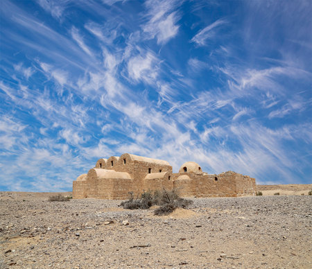 Quseir (Qasr) Amra desert castle (against the sky with clouds) near Amman, Jordan. World heritage with famous fresco's. Built in 8th century, of early Islamic art and architectureの写真素材