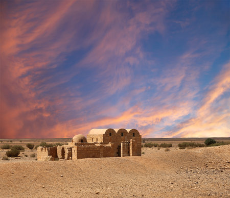 Quseir (Qasr) Amra desert castle (against the sky with clouds) near Amman, Jordan. World heritage with famous fresco's. Built in 8th century, of early Islamic art and architectureの写真素材