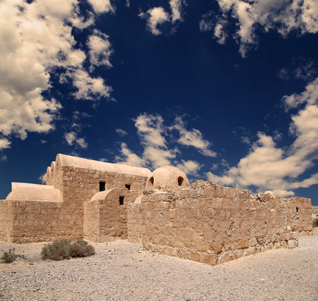 Quseir (Qasr) Amra desert castle (against the sky with clouds) near Amman, Jordan. World heritage with famous fresco's. Built in 8th century, of early Islamic art and architectureの写真素材