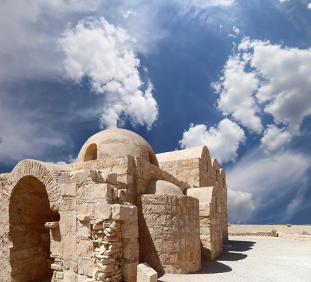 Quseir (Qasr) Amra desert castle (against the sky with clouds) near Amman, Jordan. World heritage with famous fresco's. Built in 8th century, of early Islamic art and architectureの写真素材