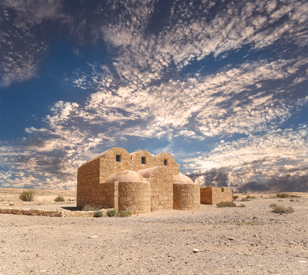 Quseir (Qasr) Amra desert castle (against the sky with clouds) near Amman, Jordan. World heritage with famous fresco's. Built in 8th century, of early Islamic art and architectureの写真素材