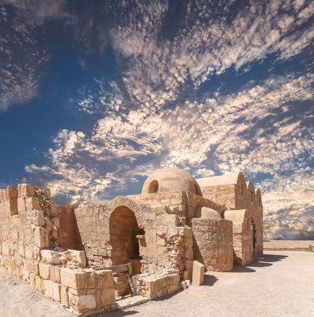 Quseir (Qasr) Amra desert castle (against the sky with clouds) near Amman, Jordan. World heritage with famous fresco's. Built in 8th century, of early Islamic art and architectureの写真素材
