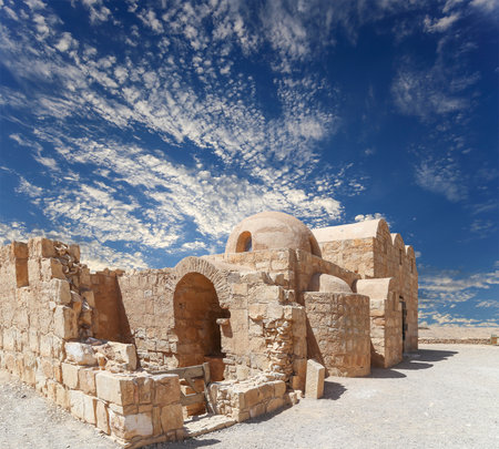 Quseir (Qasr) Amra desert castle (against the sky with clouds) near Amman, Jordan. World heritage with famous fresco's. Built in 8th century, of early Islamic art and architectureの写真素材