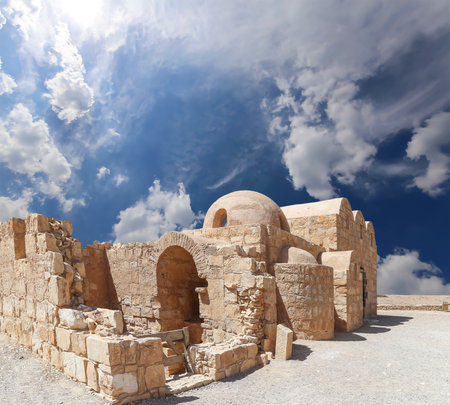 Quseir (Qasr) Amra desert castle (against the sky with clouds) near Amman, Jordan. World heritage with famous fresco's. Built in 8th century, of early Islamic art and architectureの写真素材