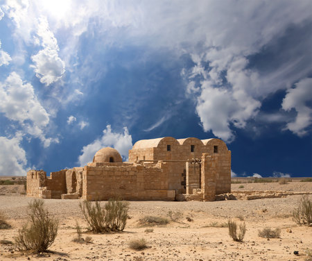 Quseir (Qasr) Amra desert castle (against the sky with clouds) near Amman, Jordan. World heritage with famous fresco's. Built in 8th century, of early Islamic art and architectureの写真素材