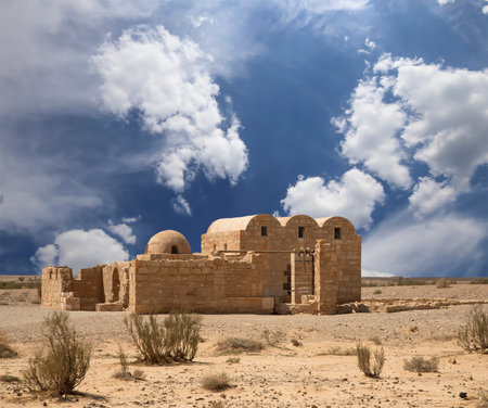 Quseir (Qasr) Amra desert castle (against the sky with clouds) near Amman, Jordan. World heritage with famous fresco's. Built in 8th century, of early Islamic art and architectureの写真素材