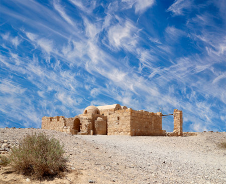 Quseir (Qasr) Amra desert castle (against the sky with clouds) near Amman, Jordan. World heritage with famous fresco's. Built in 8th century, of early Islamic art and architectureの写真素材