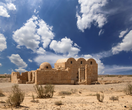 Quseir (Qasr) Amra desert castle (against the sky with clouds) near Amman, Jordan. World heritage with famous fresco's. Built in 8th century, of early Islamic art and architectureの写真素材