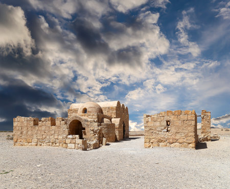 Quseir (Qasr) Amra desert castle (against the sky with clouds) near Amman, Jordan. World heritage with famous fresco's. Built in 8th century, of early Islamic art and architectureの写真素材
