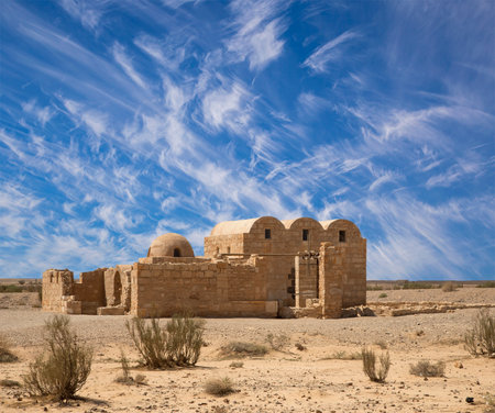 Quseir (Qasr) Amra desert castle (against the sky with clouds) near Amman, Jordan. World heritage with famous fresco's. Built in 8th century, of early Islamic art and architectureの写真素材