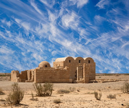 Quseir (Qasr) Amra desert castle (against the sky with clouds) near Amman, Jordan. World heritage with famous fresco's. Built in 8th century, of early Islamic art and architectureの写真素材