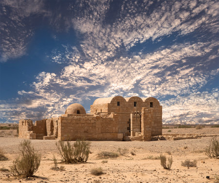 Quseir (Qasr) Amra desert castle (against the sky with clouds) near Amman, Jordan. World heritage with famous fresco's. Built in 8th century, of early Islamic art and architectureの写真素材
