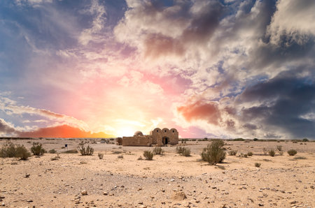 Quseir (Qasr) Amra desert castle (against the sky with clouds) near Amman, Jordan. World heritage with famous fresco's. Built in 8th century, of early Islamic art and architectureの写真素材