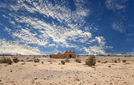 Quseir (Qasr) Amra desert castle (against the sky with clouds) near Amman, Jordan. World heritage with famous fresco's. Built in 8th century, of early Islamic art and architectureの写真素材