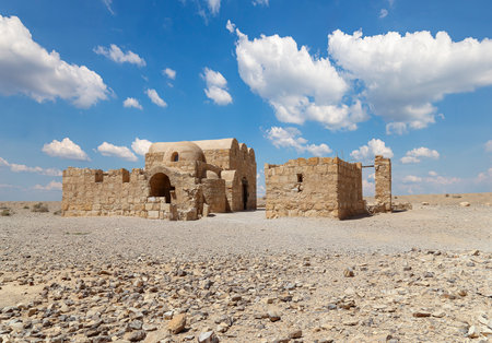 Quseir (Qasr) Amra desert castle (against the sky with clouds) near Amman, Jordan. World heritage with famous fresco's. Built in 8th century, of early Islamic art and architectureの写真素材