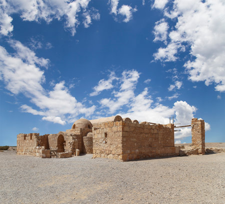 Quseir (Qasr) Amra desert castle (against the sky with clouds) near Amman, Jordan. World heritage with famous fresco's. Built in 8th century, of early Islamic art and architectureの写真素材