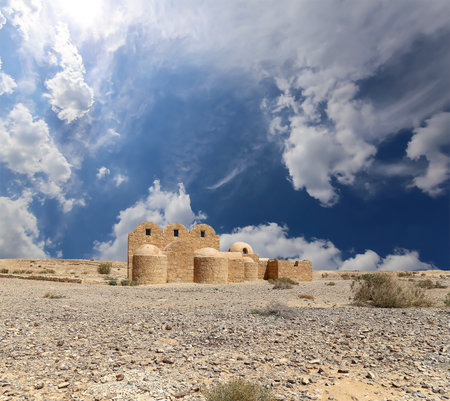 Quseir (Qasr) Amra desert castle (against the sky with clouds) near Amman, Jordan. World heritage with famous fresco's. Built in 8th century, of early Islamic art and architectureの写真素材