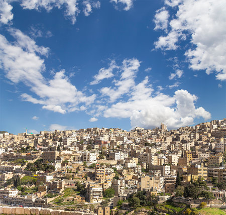 Amman city landmarks -- old roman Citadel Hill, Jordan. Against the background of a beautiful sky with cloudsの写真素材