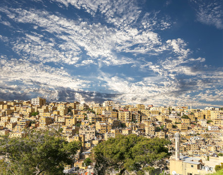 Amman city landmarks-- old roman Citadel Hill, Jordan. Against the background of a beautiful sky with cloudsの写真素材