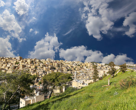 Amman city landmarks-- old roman Citadel Hill, Jordan. Against the background of a beautiful sky with cloudsの写真素材