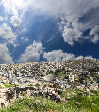 Amman city landmarks-- old roman Citadel Hill, Jordan. Against the background of a beautiful sky with cloudsの写真素材