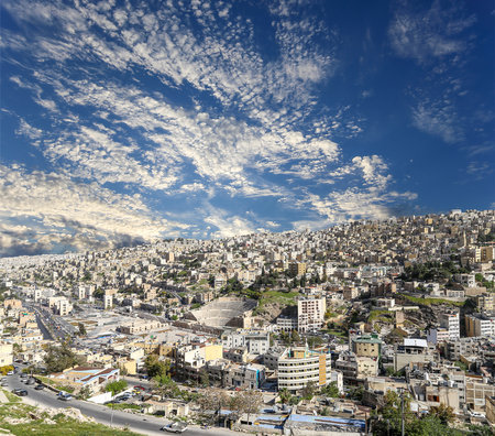 Amman city landmarks-- old roman Citadel Hill, Jordan. Against the background of a beautiful sky with cloudsの写真素材