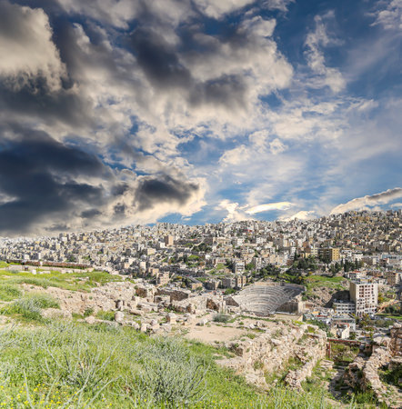 Amman city landmarks-- old roman Citadel Hill, Jordan. Against the background of a beautiful sky with cloudsの写真素材