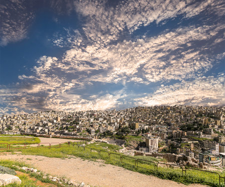 Amman city landmarks-- old roman Citadel Hill, Jordan. Against the background of a beautiful sky with cloudsの写真素材