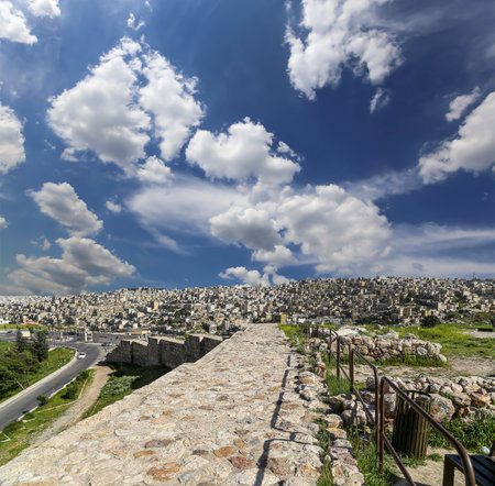 Amman city landmarks-- old roman Citadel Hill, Jordan. Against the background of a beautiful sky with cloudsの写真素材
