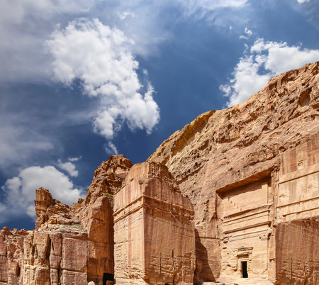 Mountains of Petra (against the background of a beautiful sky with clouds), Jordan, Middle East. Petra has been a UNESCO World Heritage Site since 1985の写真素材