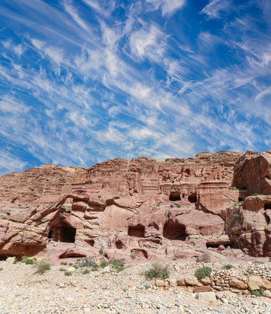 Mountains of Petra (against the background of a beautiful sky with clouds), Jordan, Middle East. Petra has been a UNESCO World Heritage Site since 1985の写真素材