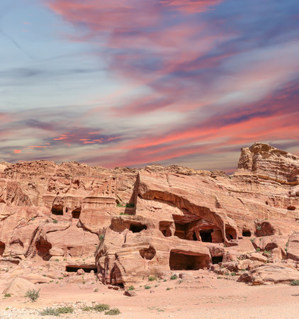 Mountains of Petra (against the background of a beautiful sky with clouds), Jordan, Middle East. Petra has been a UNESCO World Heritage Site since 1985の写真素材