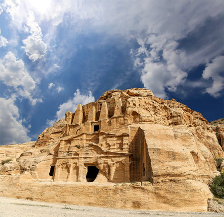 Mountains of Petra (against the background of a beautiful sky with clouds), Jordan, Middle East. Petra has been a UNESCO World Heritage Site since 1985の写真素材
