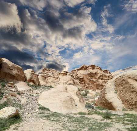 Mountains of Petra (against the background of a beautiful sky with clouds), Jordan, Middle East. Petra has been a UNESCO World Heritage Site since 1985の写真素材