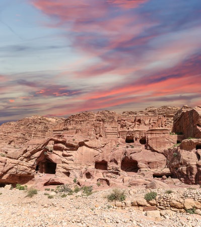 Mountains of Petra (against the background of a beautiful sky with clouds), Jordan, Middle East. Petra has been a UNESCO World Heritage Site since 1985の写真素材