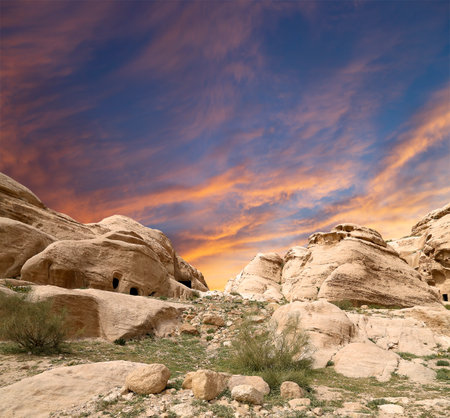 Mountains of Petra (against the background of a beautiful sky with clouds), Jordan, Middle East. Petra has been a UNESCO World Heritage Site since 1985の写真素材