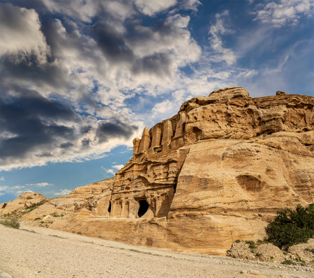 Mountains of Petra (against the background of a beautiful sky with clouds), Jordan, Middle East. Petra has been a UNESCO World Heritage Site since 1985の写真素材