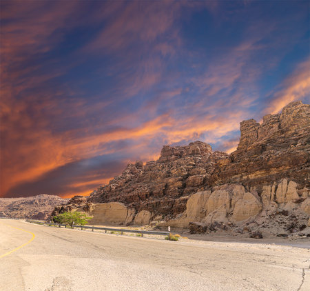 Mountains of Petra (against the background of a beautiful sky with clouds), Jordan, Middle East. Petra has been a UNESCO World Heritage Site since 1985の写真素材