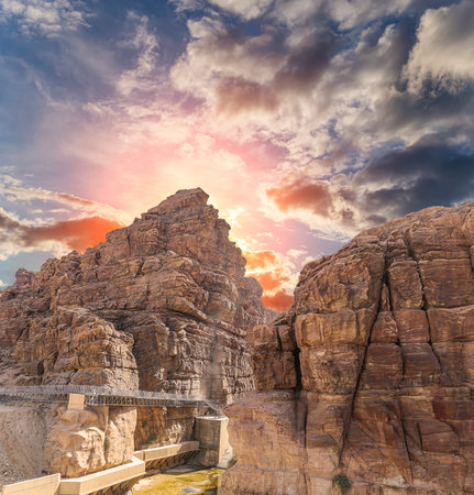 Mountains of Petra (against the background of a beautiful sky with clouds), Jordan, Middle East. Petra has been a UNESCO World Heritage Site since 1985の写真素材