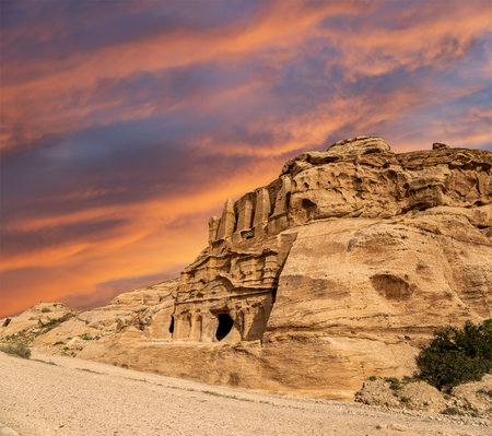 Mountains of Petra (against the background of a beautiful sky with clouds), Jordan, Middle East. Petra has been a UNESCO World Heritage Site since 1985の写真素材