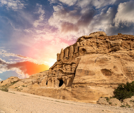 Mountains of Petra (against the background of a beautiful sky with clouds), Jordan, Middle East. Petra has been a UNESCO World Heritage Site since 1985の写真素材