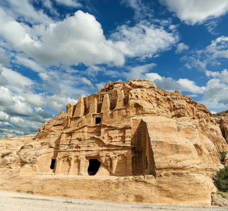 Mountains of Petra (against the background of a beautiful sky with clouds), Jordan, Middle East. Petra has been a UNESCO World Heritage Site since 1985の写真素材