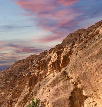Mountains of Petra (against the background of a beautiful sky with clouds), Jordan, Middle East. Petra has been a UNESCO World Heritage Site since 1985の写真素材